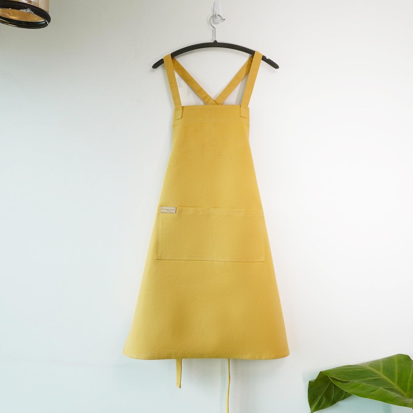 RUSTIQUE LINENS Lemon Cotton Cross Back Apron with Waterproof Inner Membrane and 2 Pockets for Men and Women – Adjustable Water Resistant Chef Apron for Cooking, Baking, BBQ, or Work