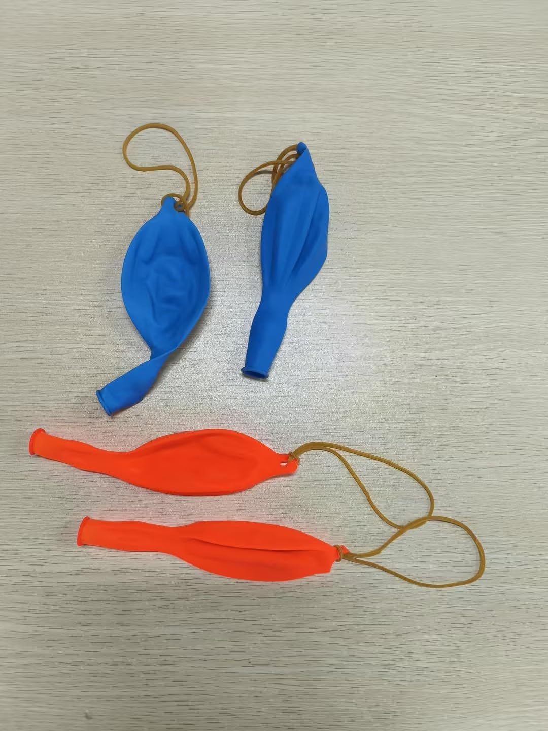 Soulchen Punch Balloons - 24 Pcs Blue & Orange Party Favors for Kids' Birthday Celebrations | Durable Rubber Band Handle