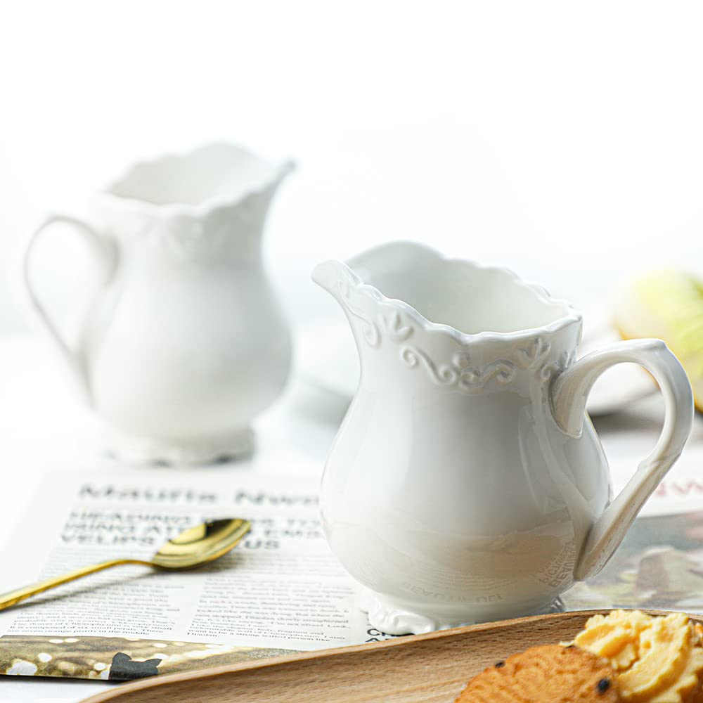 Sizikato Pure White Porcelain Creamer Pitcher with Handle, 6oz Embossed Ceramic Serving Pitcher for Tea Coffee Milk.