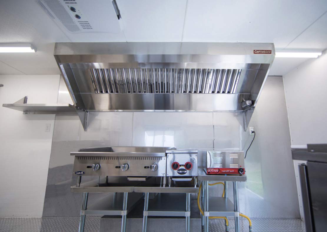 Food Truck Low Profile Exhaust Hood System Includes a stainless steel exhaust hood, an exhaust fan, an adjustable duct section, and installation hardware (4' Long Hood & Fan)