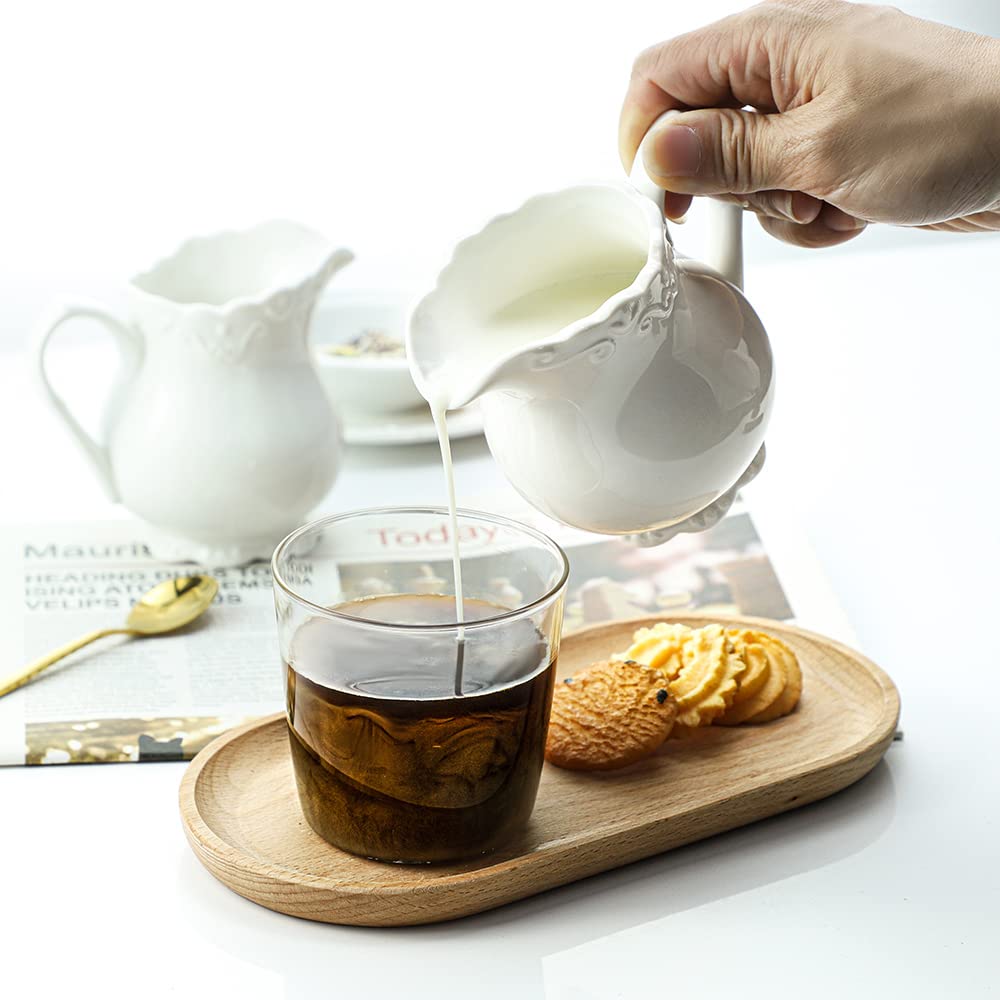 Sizikato Pure White Porcelain Creamer Pitcher with Handle, 6oz Embossed Ceramic Serving Pitcher for Tea Coffee Milk.