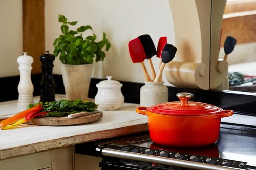 Le Creuset Enameled Cast Iron Dutch Oven - 5.5 Qt. | Signature Flame Color for Superior Cooking