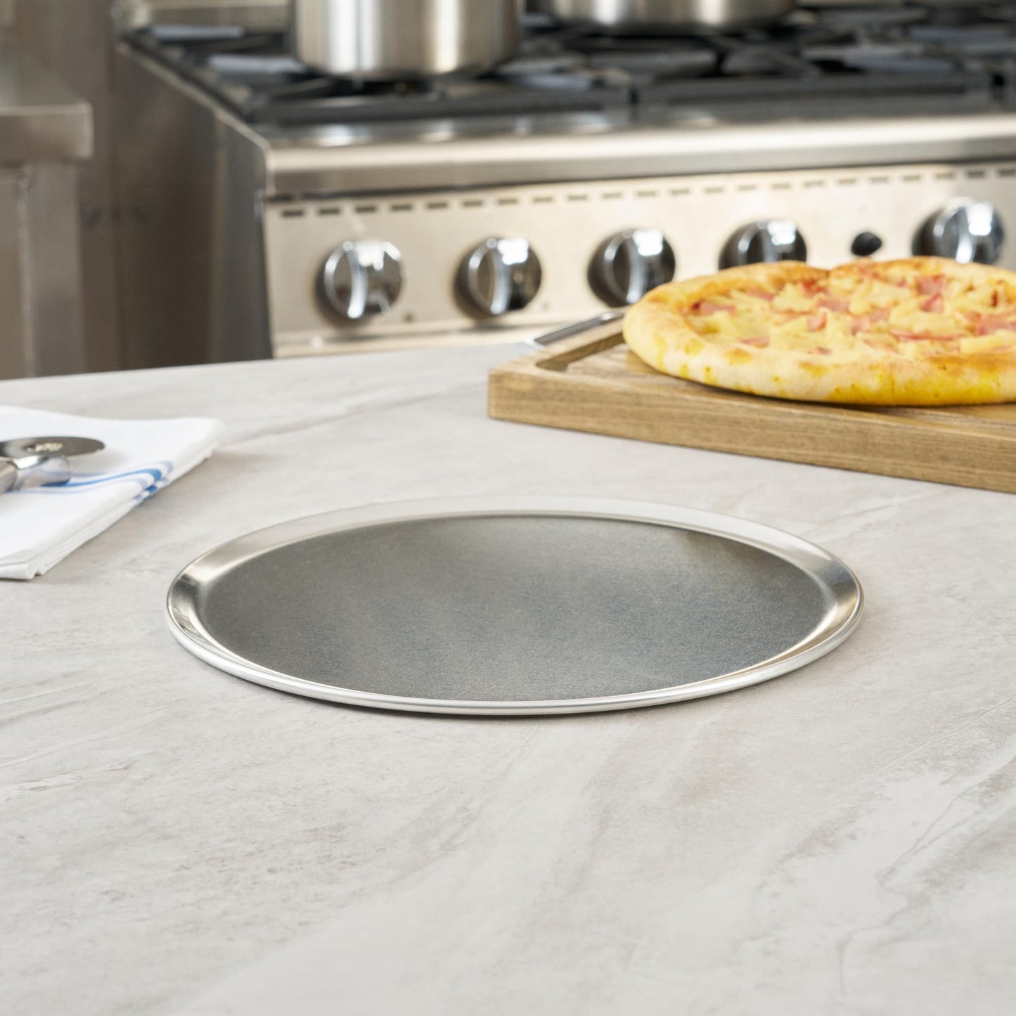 Restaurantware 12 Inch Aluminum Pizza Pan 72 Count Coupe Silver Pizza Pan, Heat Conductive Round Pizza Tray, Lightweight Corrosion-Resistant Serving Tray For Restaurant Or Home Use