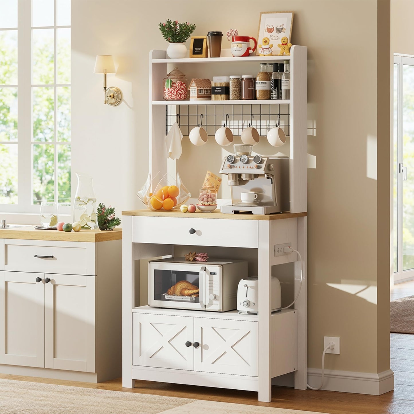 LIKIMIO Baker Rack with Spill-Safe Power Outlet & Drawer, Coffee Bar Cabinet with Storage, Farmhouse Microwave Stand with Hutch and 5 Hooks for Kitchen, White