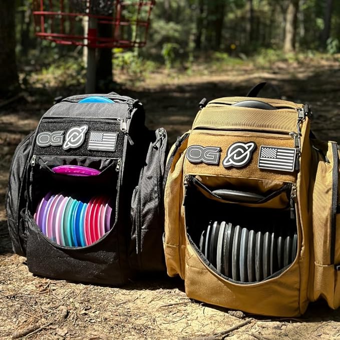 Discology Disc Golf OG V3 Disc Golf Bag | 26+ Disc Capacity | Premium Disc Golf Backpack Bag | Tough, Durable Design | 2 Large Top and Side Compartments | Top Patch Panel with Three Patchs Included