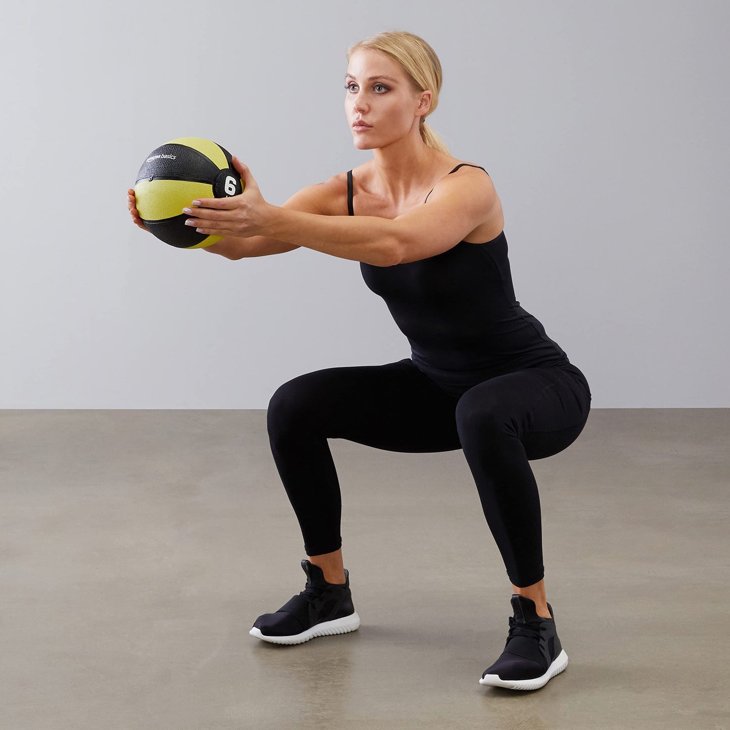 Amazon Basics Weighted Medicine Ball for Core Strength, Strength Training, Full-Body Workouts and Balance Exercises, 6 Pounds, Yellow/Black