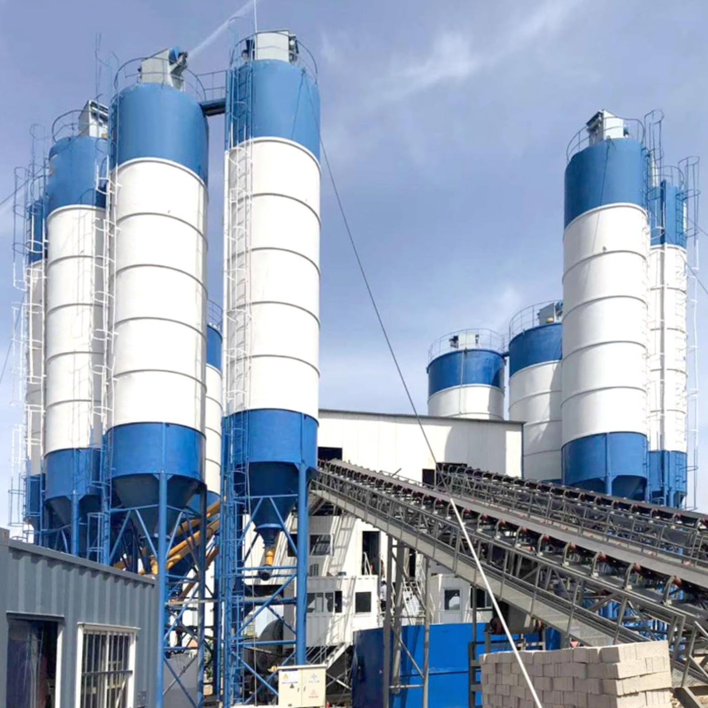 High-Output Concrete Batching Plant equipped with spiral twin-shaft mixer, efficient aggregate delivery and dust-control system, ideal for urban development, highway builds and ready-mix services
