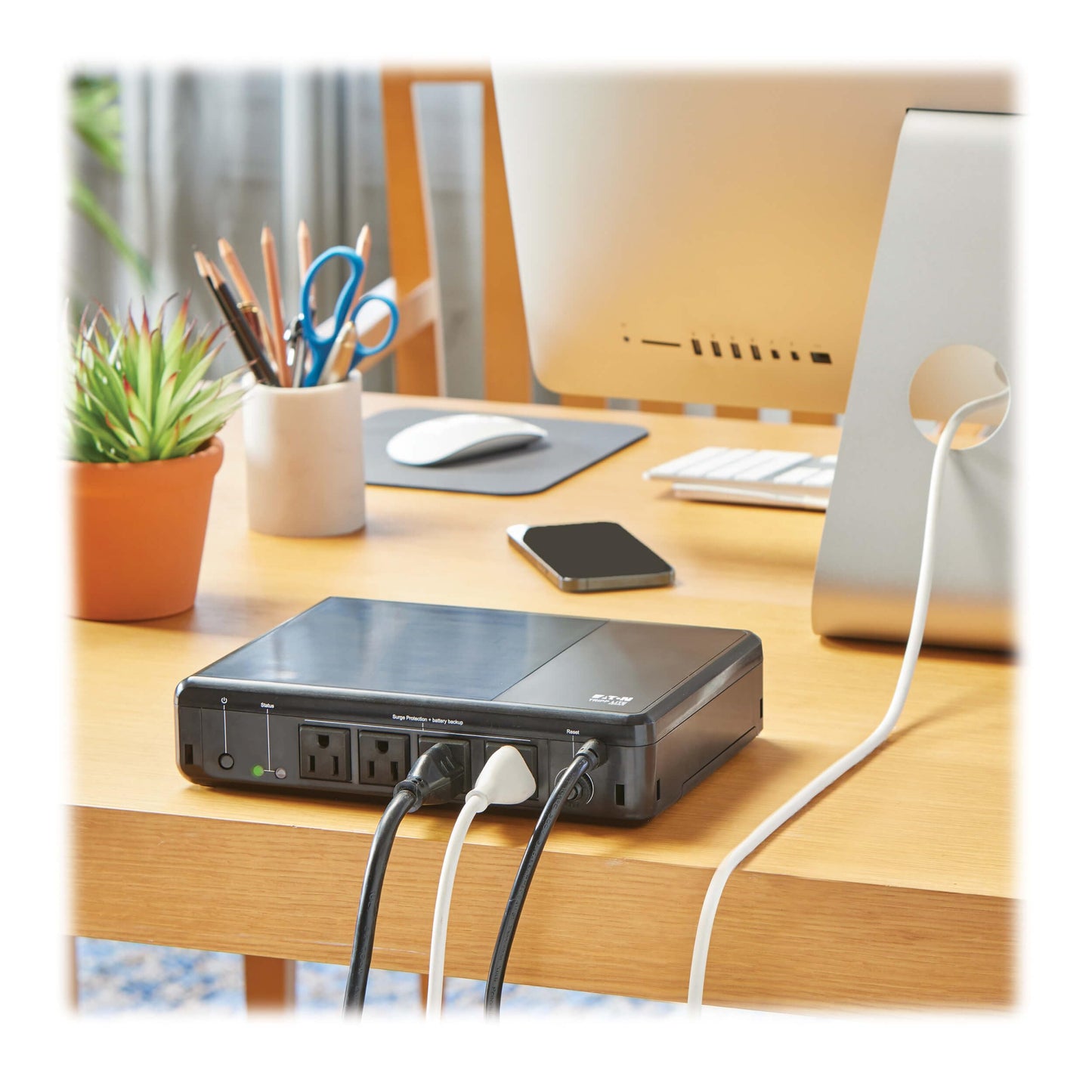 Tripp Lite 600VA UPS Desktop Battery Backup and Surge Protector, 300W, 4 Outlets, Home & Office UPS, Small Form Factor, Wall Mounting Option, 5ft Cord, 3-Year Warranty (BC600R)