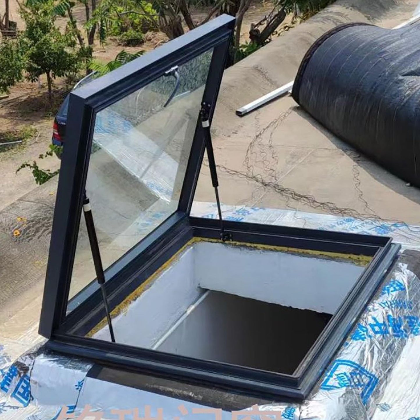 Outdoor Skylight Roof Hatch with Gas Shock Strut, Horizontal Viewing Window for Commercial and Industrial Buildings | Rotation Lock Security Feature