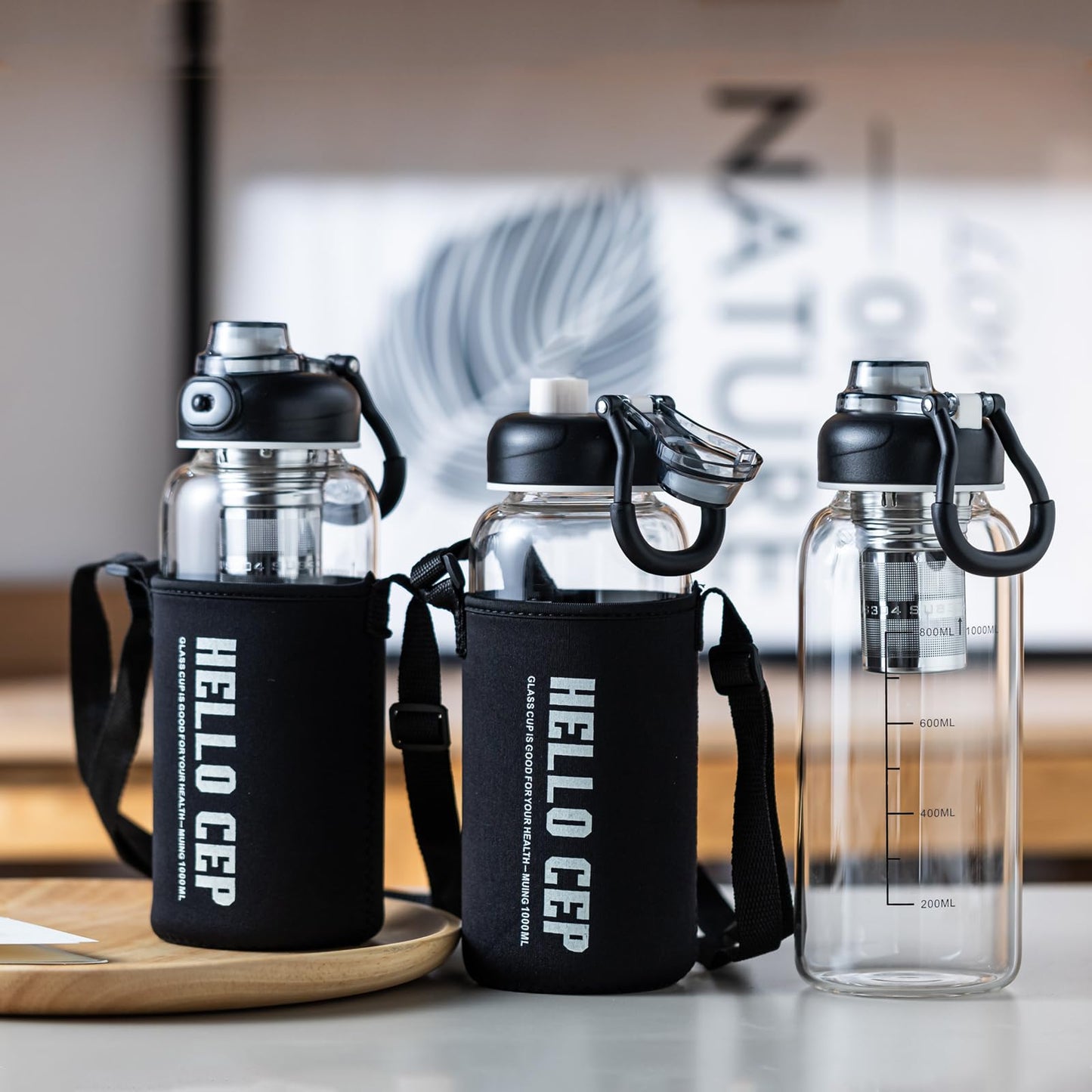 wangsdjy 34oz Glass Water Bottle with capacity Mark & Stainless Steel Tea Strainer-Large Capacity for Hot/Cold Drinks,Coffee,Tea,and Water-Includes Protective Sleeve,Perfect for Home,Office (34oz2PCS)