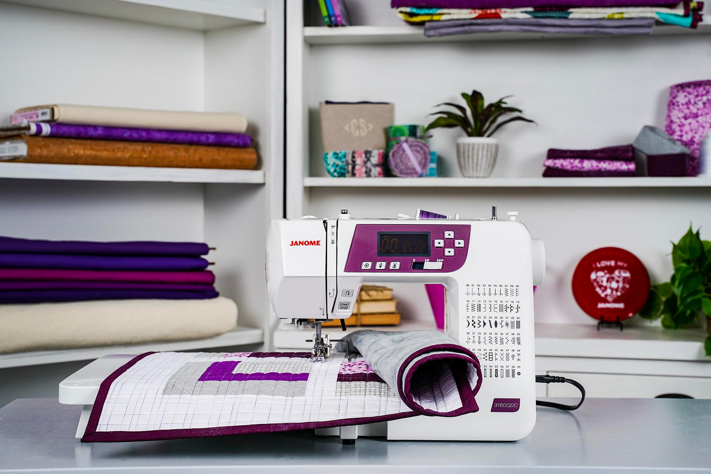 Janome 3160QDC-G Sewing and Quilting Machine with Bonus Quilt Kit!