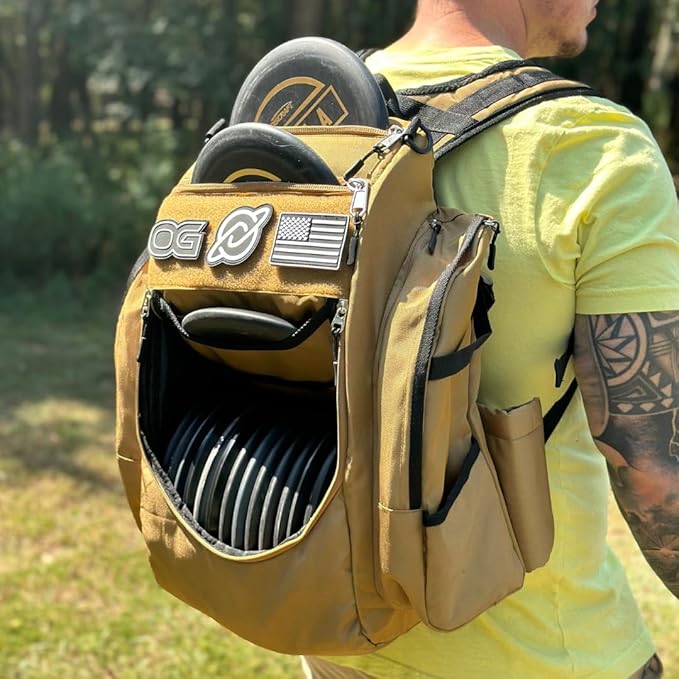 Discology Disc Golf OG V3 Disc Golf Bag | 26+ Disc Capacity | Premium Disc Golf Backpack Bag | Tough, Durable Design | 2 Large Top and Side Compartments | Top Patch Panel with Three Patchs Included