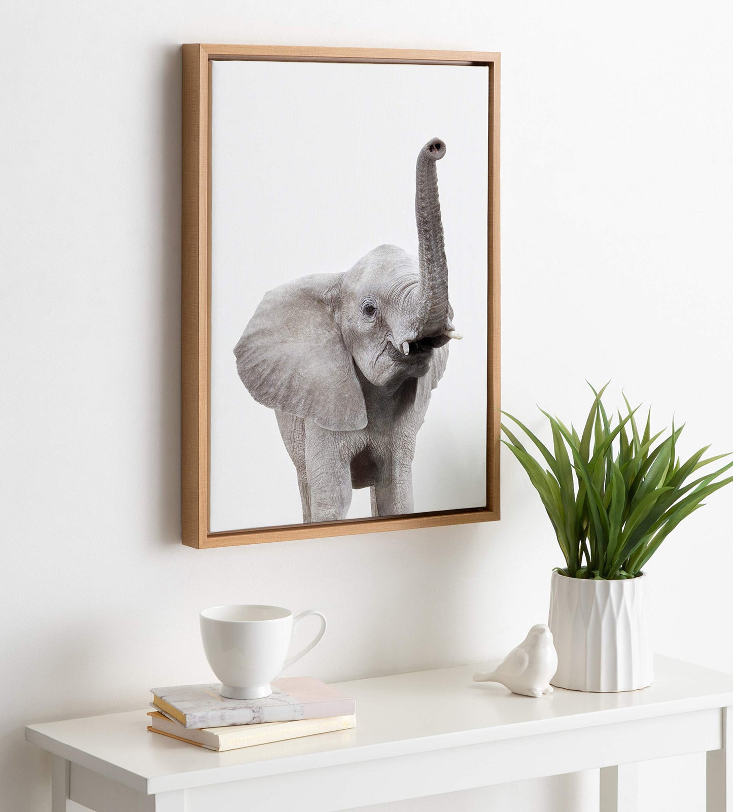 Kate and Laurel Sylvie Elephant with Raised Trunk Animal Print Portrait Framed Canvas Wall Art by Amy Peterson, 18x24 Natural