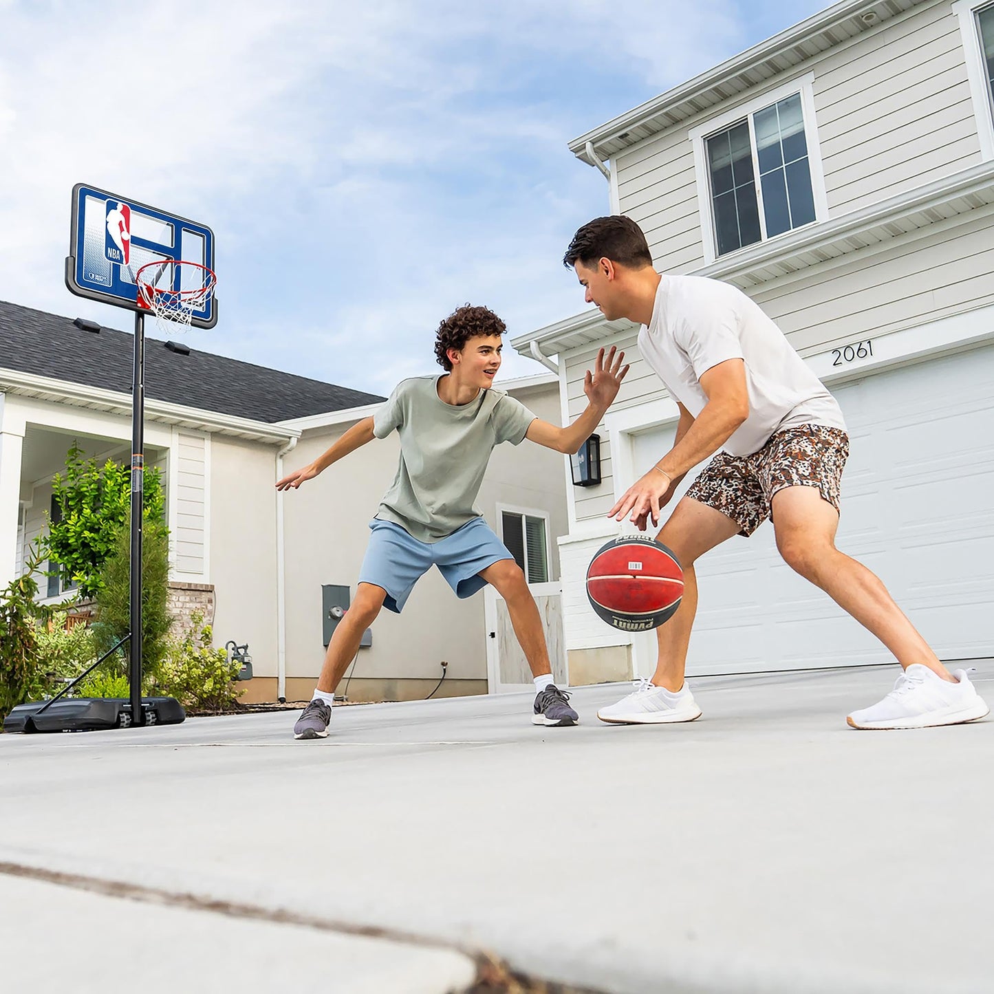 Lifetime NBA League Edition Portable Basketball Hoop, Adjustable Height 7.5-10 Ft, 44 Inch Shatterproof Fusion Backboard, Base with Wheels