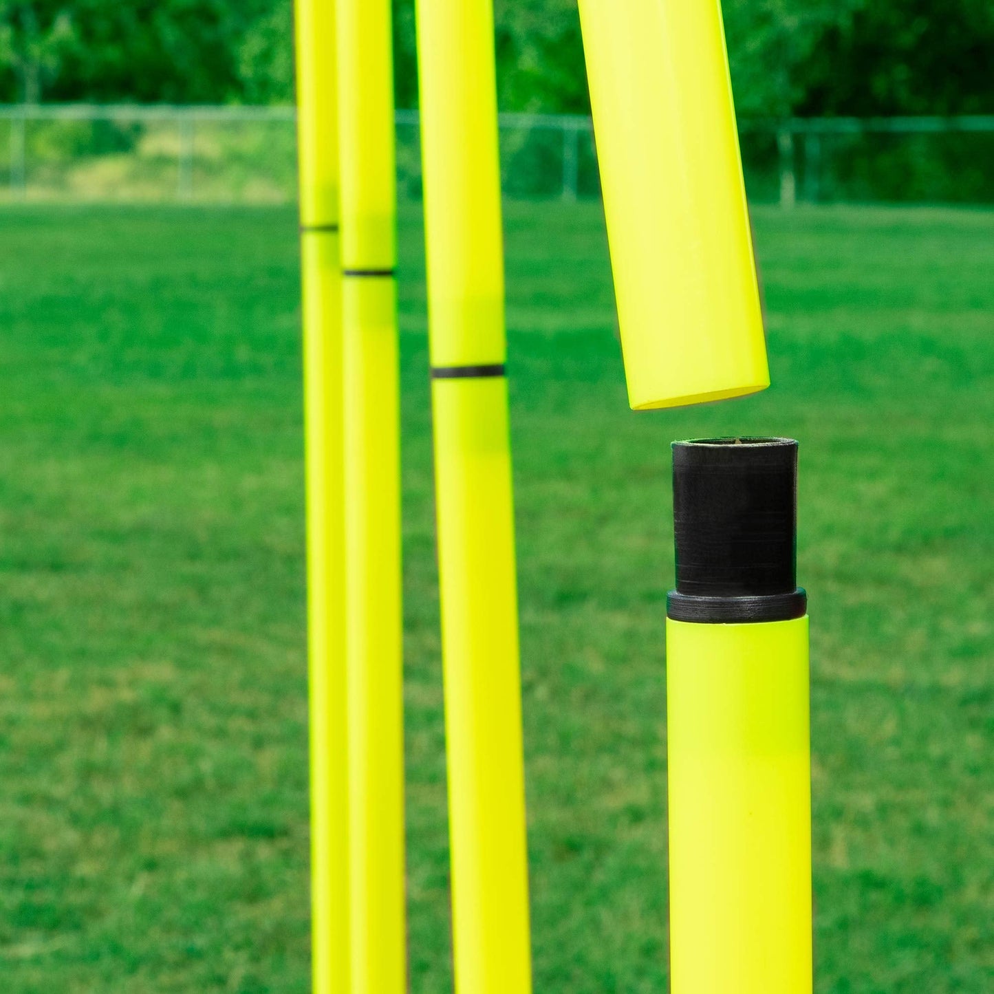 Champion Sports Outdoor Sports Agility Pole Set, 4 Rubber Bases with 12 PVC Poles, 66 Inches, Yellow