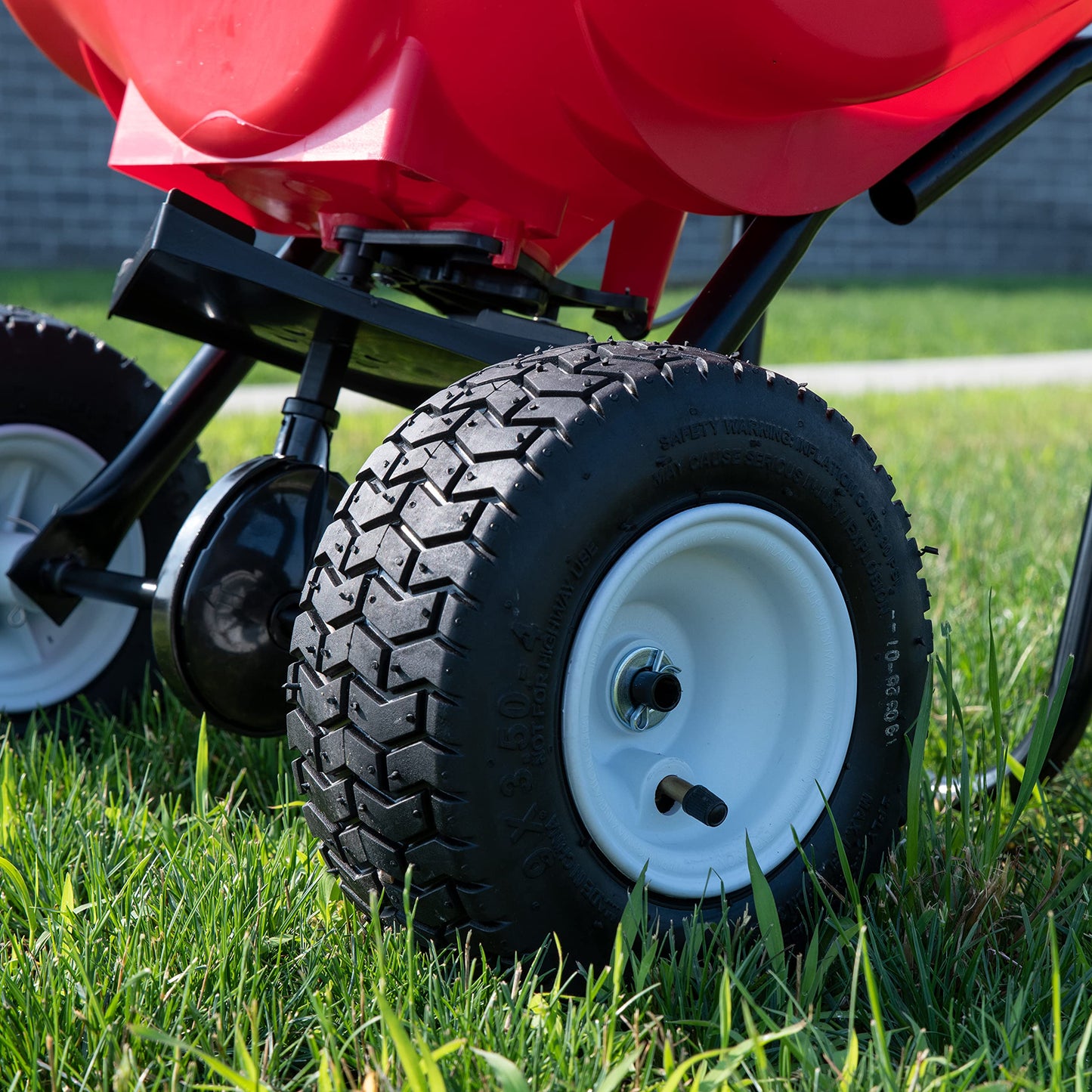 EarthWay 2030P-Plus 65 LB (29 KG) Capacity Commercial Walk-Behind Broadcast Spreader for Grass, Fertilizer, Seeds — Includes Side Spread Control, Even Spread, Pneumatic Tires
