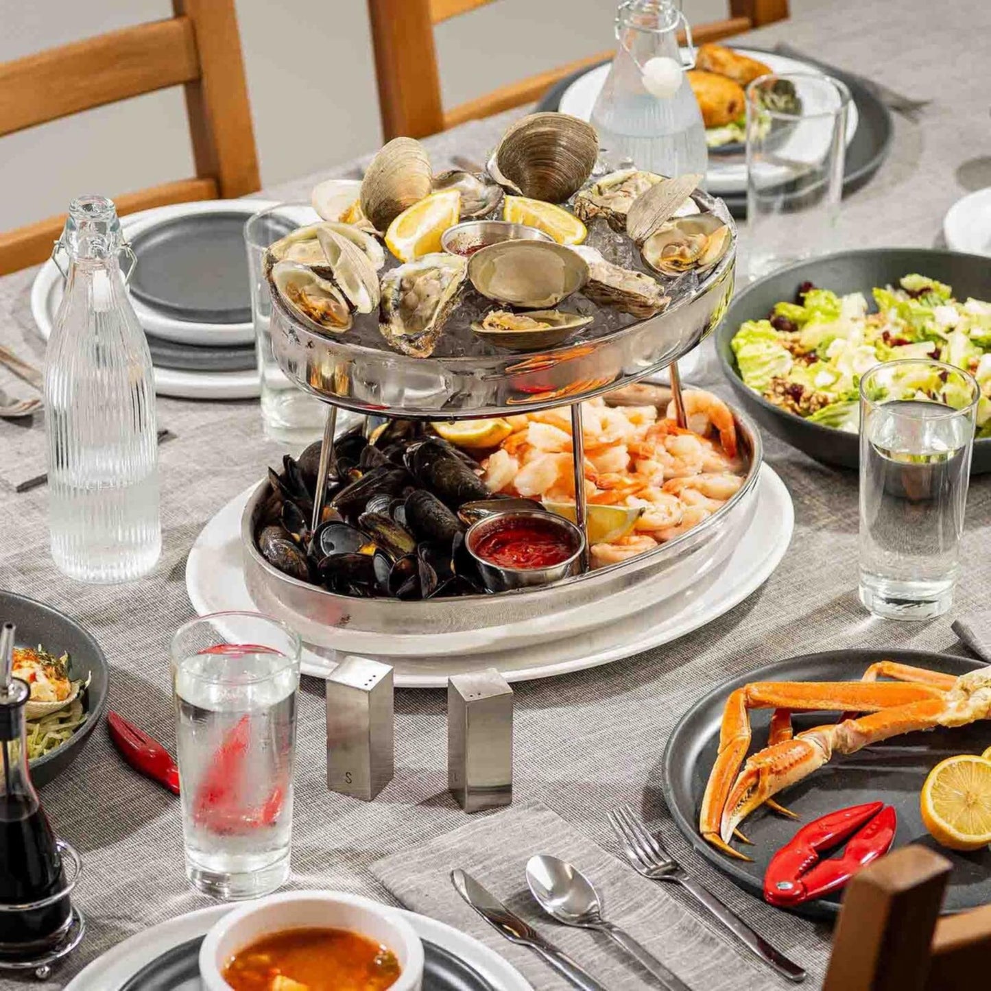 TableCraft 12914 Oval Two-Tiered Seafood Tower, Double-Wall Stainless Steel Display with Mirror Finish, 11.75" & 13.75" Oval Bowls, Elevated Chilled Presentation, 14" x 9.5" x 8.5", Silver
