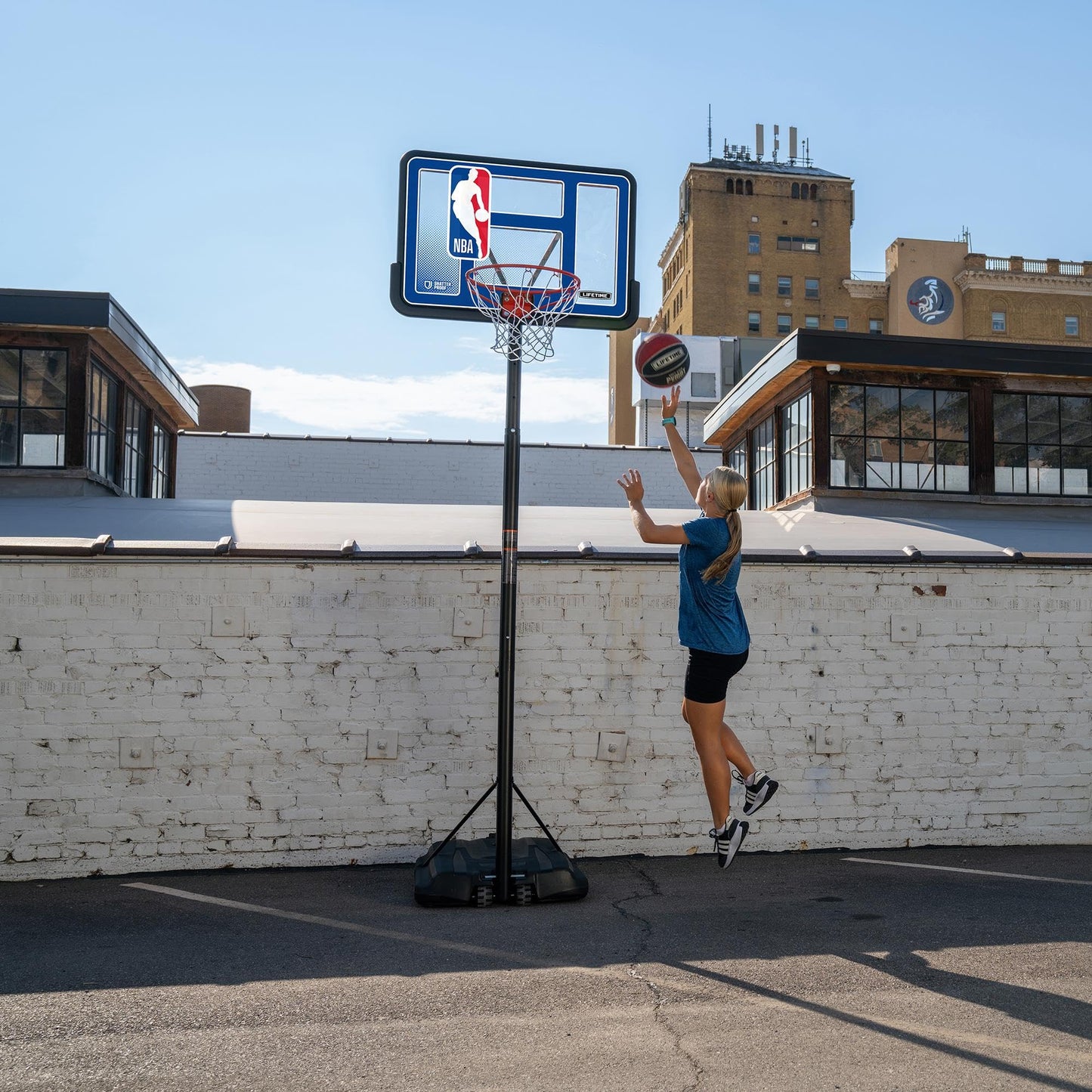 Lifetime NBA League Edition Portable Basketball Hoop, Adjustable Height 7.5-10 Ft, 44 Inch Shatterproof Fusion Backboard, Base with Wheels